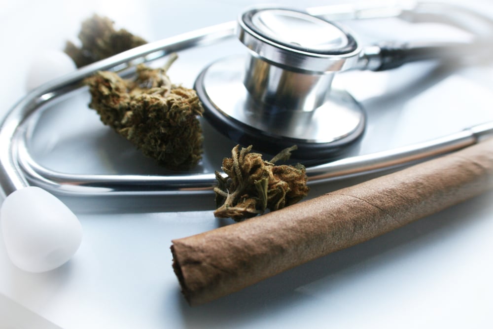 marijuana buds, joint and a stethoscope