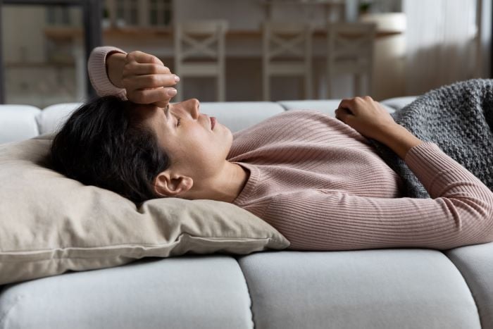 woman lying a on couch