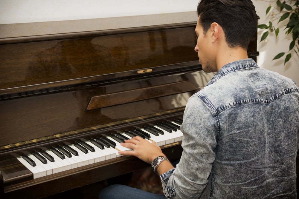 man playing piano