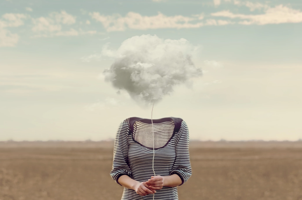 person with a cloud over their head symbolizing short term memory loss