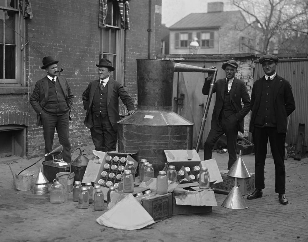prohibition agents with mason jars used to distill hard liquor