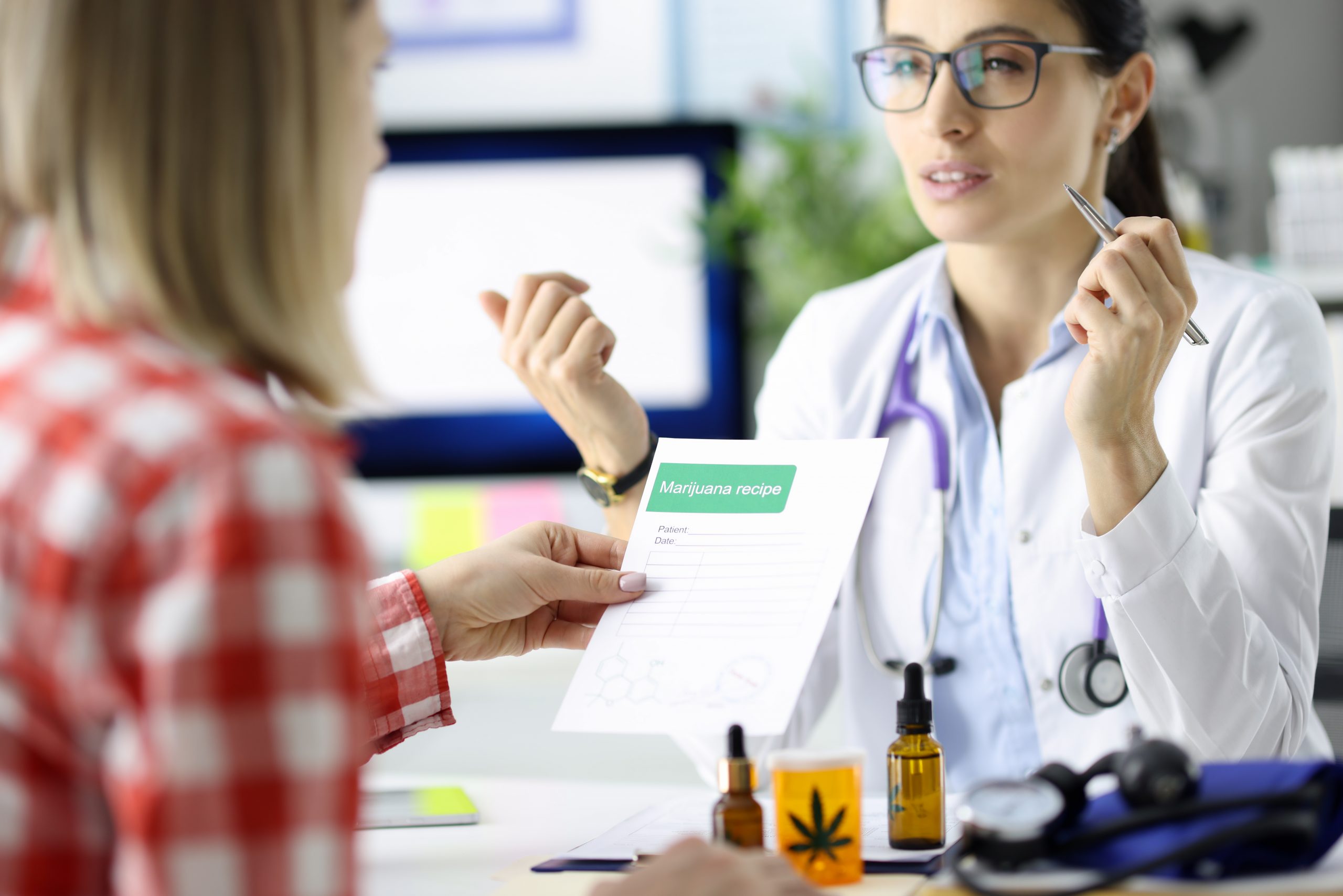 medical marijuana doctor consulting a medical patient on her prescribed treatment