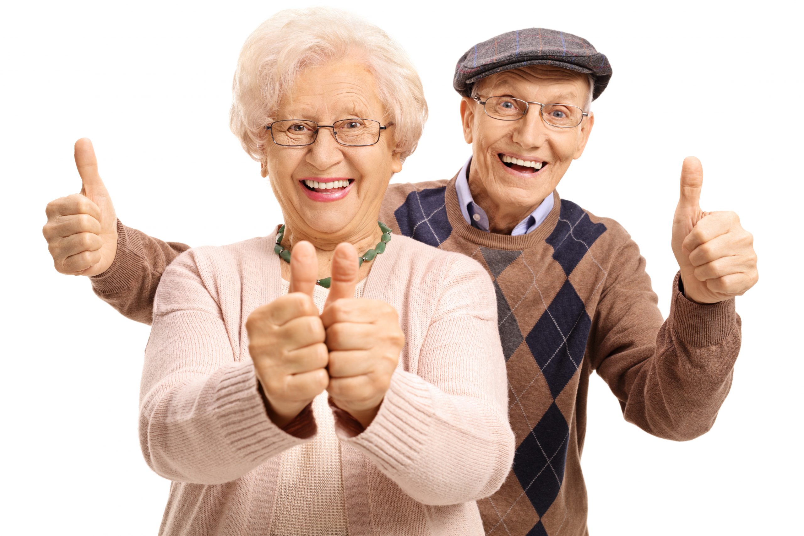 senior woman and man giving thumb-up and smiling
