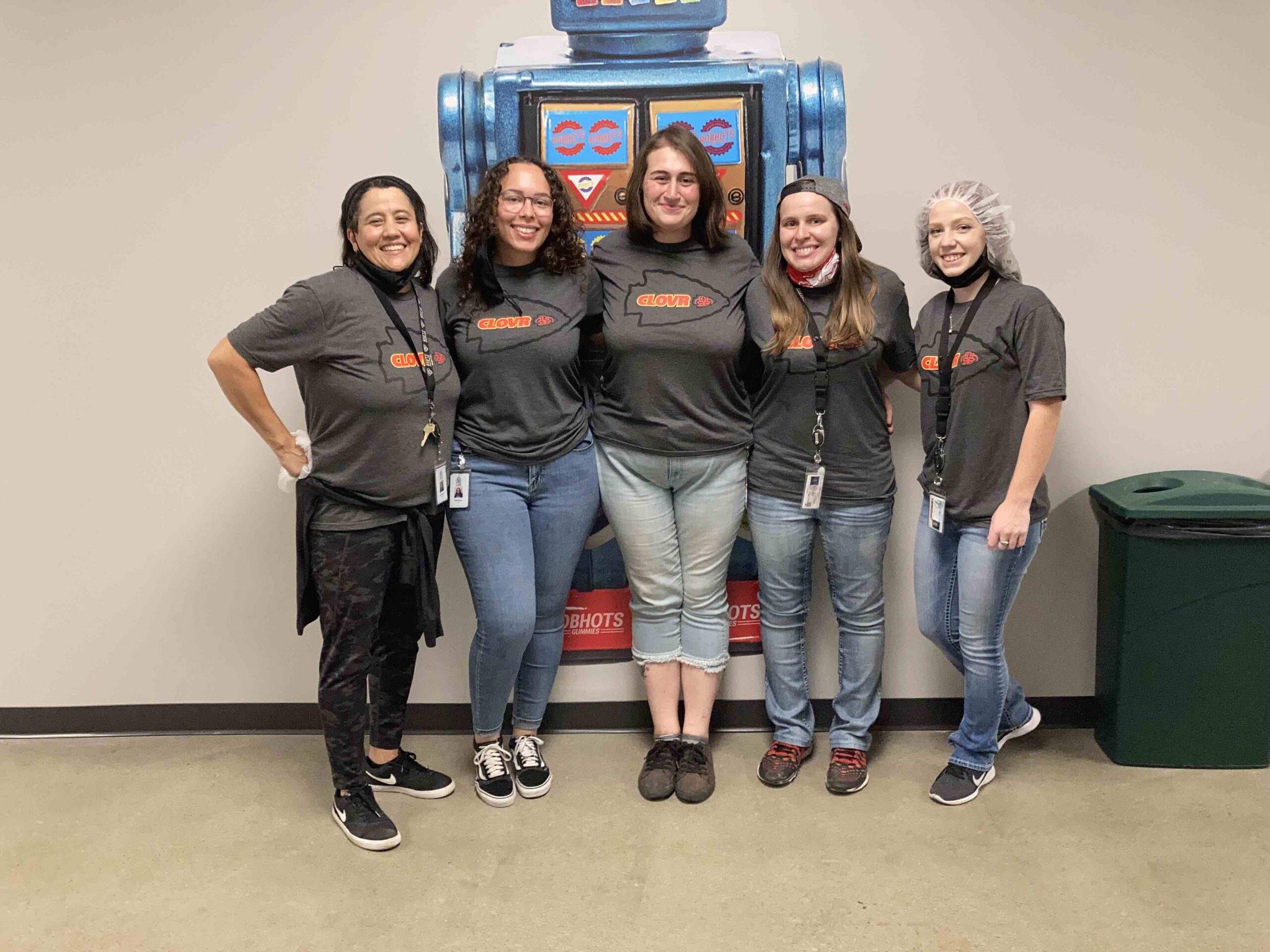 clovr team members wearing kansas city chiefs shirts