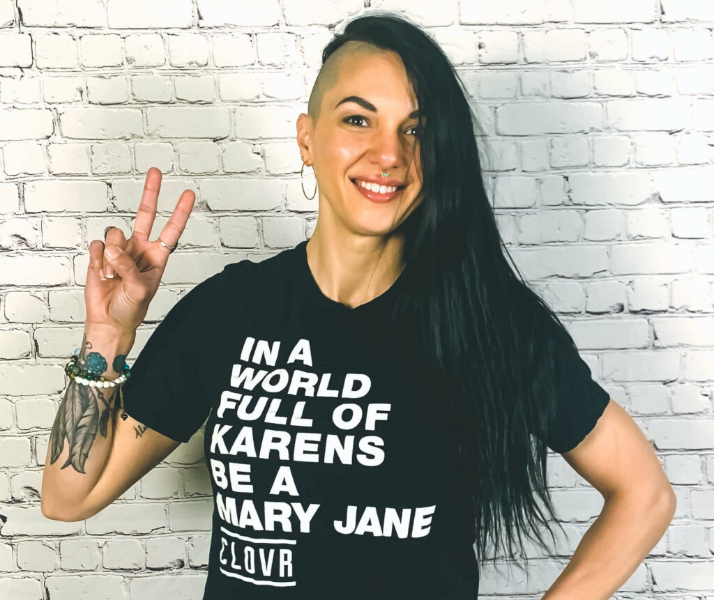 tara holm models a clovr t-shirt