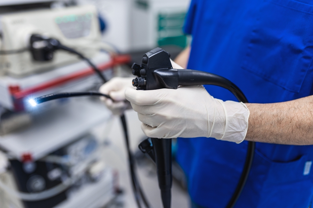 colonoscopy camera in doctor's hand