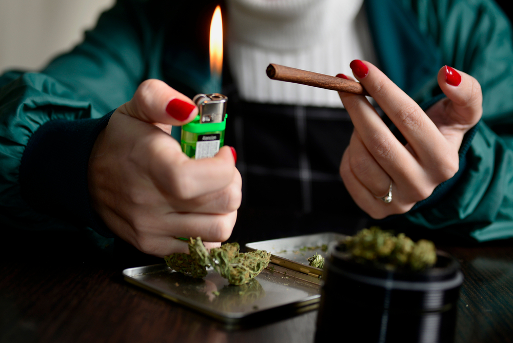woman smoking marijuana blunt joint