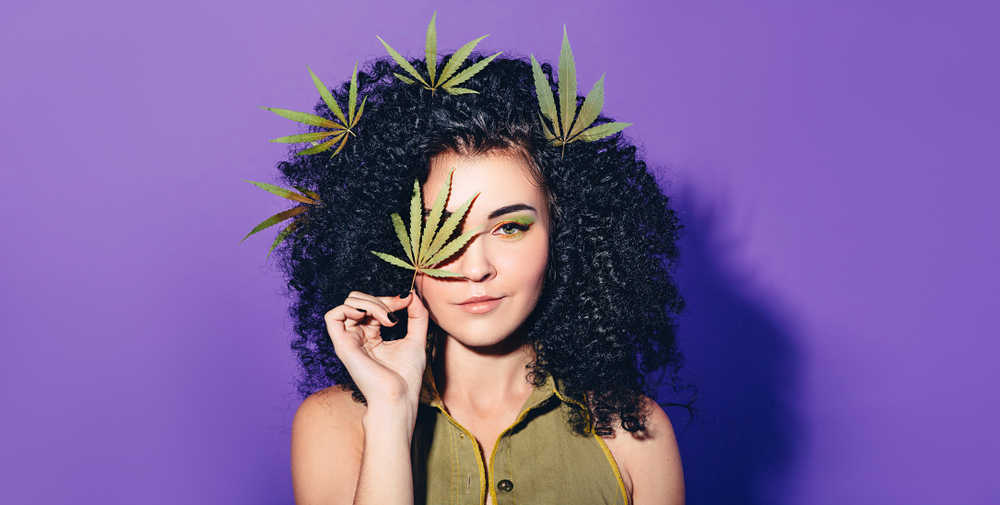 woman with marijuana leaf